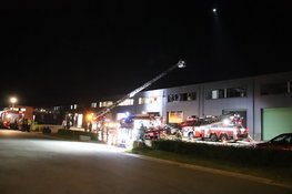 Veel schade na brand op eerste etage van bedrijfspand